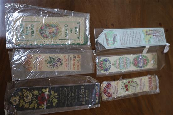 A collection of WWI embroidered silk postcards and Stevengraph bookmarks